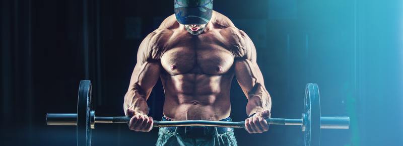 man curling weights